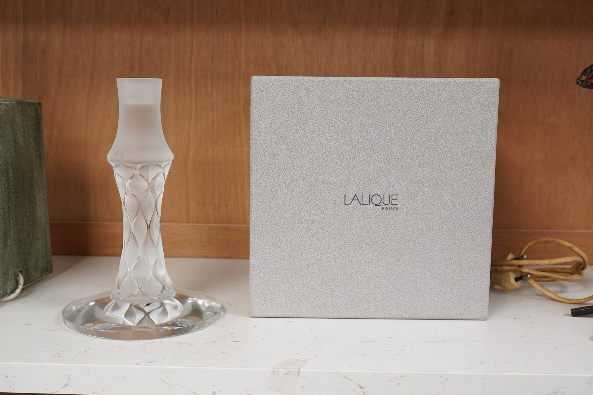 A modern Lalique glass candlestick, signed to the base, with original box, 20cm high